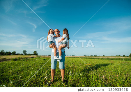 dad and two kids.Nature, blue sky, family rest 120935458