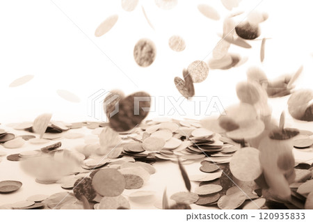 Falling confetti creating a festive and celebratory atmosphere in sepia tones 120935833