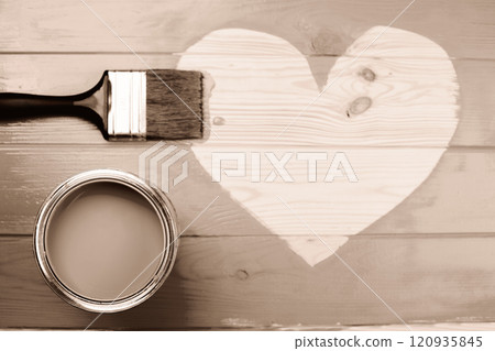 Wooden surface with paintbrush and can featuring Mocha and Mouss 120935845