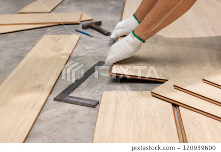 DIY Tips for Installing Interlocking Laminate Flooring 120939600