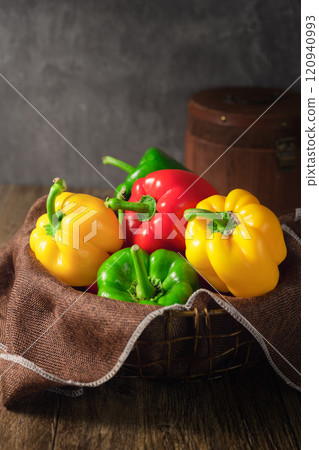 fresh peppers on wooden table fresh peppers on wooden table 120940993