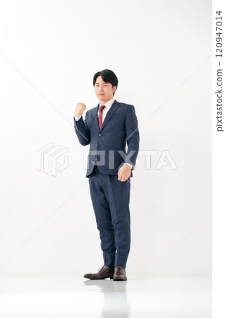Businessman, male in his 20s, fist pump 120947014