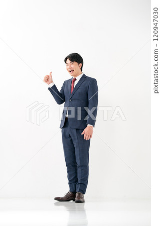 Businessman, male in his 20s, thumbs up Businessman, male in his 20s, thumbs up 120947030