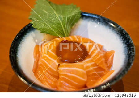 Salmon ikura don or rice bowl with Pickled Egg Yolk Salmon ikura don or rice bowl with Pickled Egg Yolk 120948019
