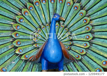 vibrant peacock sculpture with colorful feathers 120949177