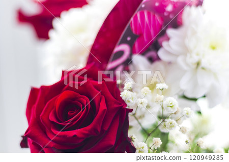 Close up shot of the valentines bouquet with beautiful, colorful flowers and post card Close up shot of the valentines bouquet with beautiful, colorful flowers and post card 120949285