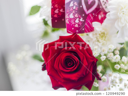 Close up shot of the valentines bouquet with beautiful, colorful flowers and post card Close up shot of the valentines bouquet with beautiful, colorful flowers and post card 120949290
