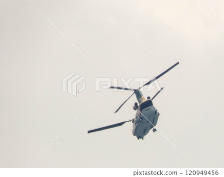 Helicopter flying away Helicopter flying away 120949456