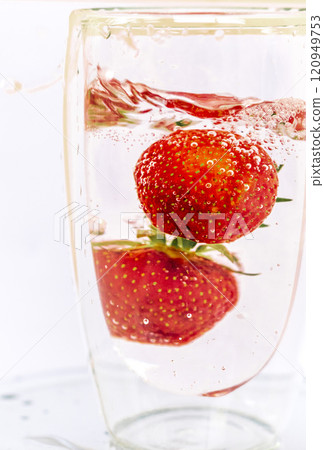 Close up shot of the strawberries in the water. Shot is good for commercials 120949753