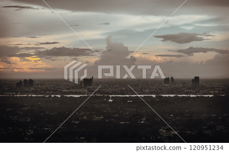 Aerial view of Bangkok city and beautiful clouds in sky background with the Chao Phraya River before sunset. Aerial view of Bangkok city and beautiful clouds in sky background with the Chao Phraya River before sunset. 120951234