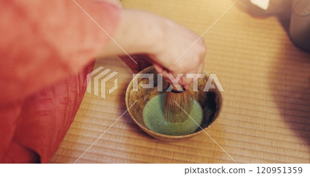 Hands, Japanese and green tea as ceremony for culture, heritage and respect as traditional beverage. Person, matcha and powder with drink, preparation and hospitality for practice or welcome in home 120951359