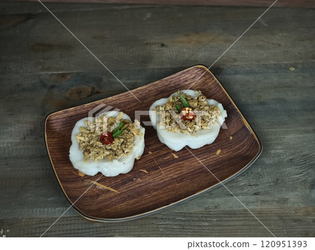 Two servings of kue talam, a traditional Indonesian steamed cake Two servings of kue talam, a traditional Indonesian steamed cake 120951393