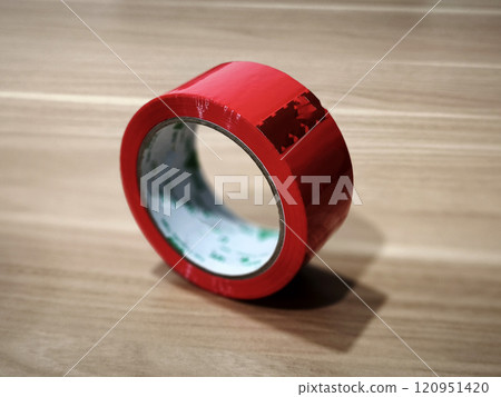 A roll of adhesive tape 120951420