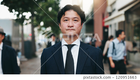 Japanese man, city street and portrait for pride as attorney in law firm, business or company. Male person, outdoor and confidence as legal professional with morning commute, career and serious face 120951663