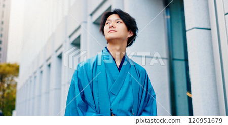 Japanese man, thinking and urban city with traditional fashion, outfit and yukata for heritage. Travel, guy and vacation for culture, journey and sightseeing with casual dress kimono and downtown Japanese man, thinking and urban city with traditional fashion, outfit and yukata for heritage. Travel, guy and vacation for culture, journey and sightseeing with casual dress kimono and downtown 120951679