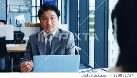 Talking, consulting and man with client, office and laptop for inquiry, medical info and life insurance. Bank, underwriter and explaining of premium rate, people and application in firm and Japan Talking, consulting and man with client, office and laptop for inquiry, medical info and life insurance. Bank, underwriter and explaining of premium rate, people and application in firm and Japan 120951724