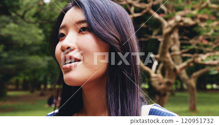 Asian woman, tourist and dream with nature for travel, sightseeing adventure or outdoor journey in forest. Japan, female person or tourism thinking in wonder for location, destination or walk at park 120951732
