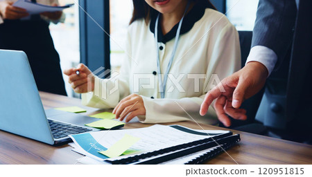 Business people, hands and documents with laptop in meeting for project, corporate planning or agenda at office. Closeup, Japan or employees with paperwork for company policy or reports at workplace Business people, hands and documents with laptop in meeting for project, corporate planning or agenda at office. Closeup, Japan or employees with paperwork for company policy or reports at workplace 120951815