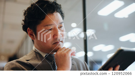 Japan, employee and man with tablet, thinking and internet with stock market, connection and network. Asian person, solution and accountant in modern office, communication and digital app for email 120952066