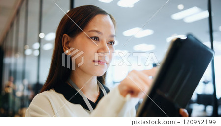 Business, woman and connection on tablet in office for portfolio management, funding application request or investment. Japanese firm, budget analyst or digital app for contract agreement or feedback Business, woman and connection on tablet in office for portfolio management, funding application request or investment. Japanese firm, budget analyst or digital app for contract agreement or feedback 120952199