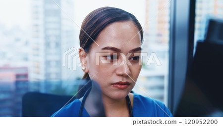 Office, woman or nurse at computer for research, schedule planning or checking web for hospital management. Healthcare, reading and Japanese medical professional with online report, review or email. Office, woman or nurse at computer for research, schedule planning or checking web for hospital management. Healthcare, reading and Japanese medical professional with online report, review or email. 120952200