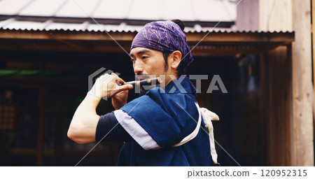 Japanese man, flute and music for history, artist performance and zen sound for Shinto meditation. Sensei person, bamboo and fue instrument for practice, culture and spiritual heritage with Ryeteki Japanese man, flute and music for history, artist performance and zen sound for Shinto meditation. Sensei person, bamboo and fue instrument for practice, culture and spiritual heritage with Ryeteki 120952315