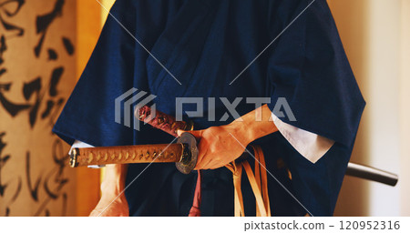 Japan, martial arts and hands of samurai with sword for self defense, combat or protection in battle. Sensei closeup, person and weapon in sheath for routine practice, cultural discipline or kenjutsu 120952316