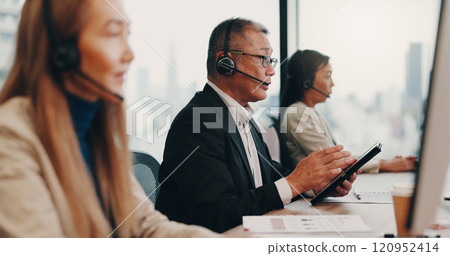 Call center, headset and businessman in office for customer service, crm or online consultation. Telemarketing, contact and male technical support advisor with mic tech for ecommerce query in Japan. Call center, headset and businessman in office for customer service, crm or online consultation. Telemarketing, contact and male technical support advisor with mic tech for ecommerce query in Japan. 120952414