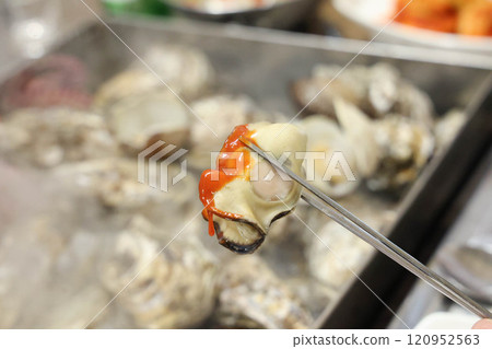 Korean seafood. Steamed Oysters with red chili pepper paste with vinegar 120952563