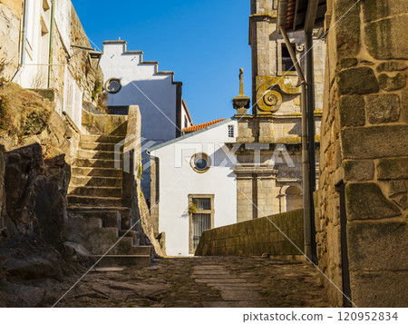 Cobblestone alley in the historic center of Porto, Portugal 120952834