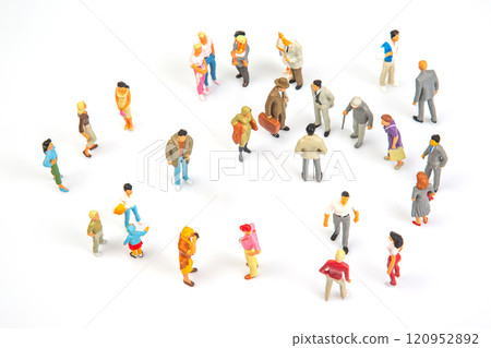 miniature people. different people stand on a white background 120952892