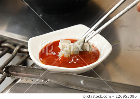Korean seafood. bbq Oysters with red chili pepper paste with vinegar Korean seafood. bbq Oysters with red chili pepper paste with vinegar 120953090