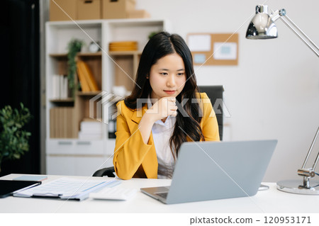 Business woman using tablet and laptop for doing math finance on an office desk, tax, report, accounting, statistics, Business woman using tablet and laptop for doing math finance on an office desk, tax, report, accounting, statistics, 120953171