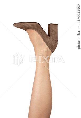 Women slim leg raised up, wearing heeled shoe mocha mousse isolated on white Women slim leg raised up, wearing heeled shoe mocha mousse isolated on white 120953502