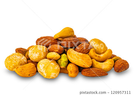 Closeup view pile of crispy salted mixed nuts isolated on white background. 120957311
