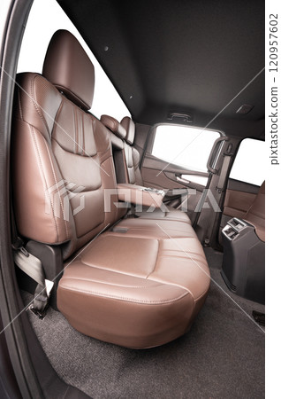 Side view of car cabin with brown seat 120957602