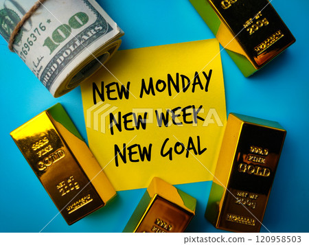 Gold bar and banknotes with text New Monday New week New Goal on a blue background. Business concept. 120958503