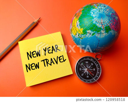 Sticky note,earth globe and compass with text New year and New travel on a orange background. Business and travel concept. Sticky note,earth globe and compass with text New year and New travel on a orange background. Business and travel concept. 120958518