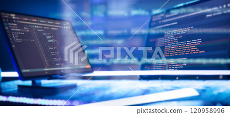 Abstract software development concept with code and laptop on blurred background representing programming, coding and technology 120958996