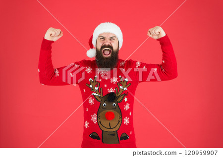 Add some sparkle to Christmas. happy new 2020 year. funny hipster knitted sweater. winter holiday celebration. feel joy and hapiness. bearded man red santa hat. christmas time. male at xmas party Add some sparkle to Christmas. happy new 2020 year. funny hipster knitted sweater. winter holiday celebration. feel joy and hapiness. bearded man red santa hat. christmas time. male at xmas party 120959907