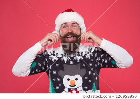male winter hair care and fashion. happy new year. merry christmas. cheerful bearded man in santa hat and sweater. brutal hipster celebrate xmas party. winter holiday preparations. Lets do this 120959950