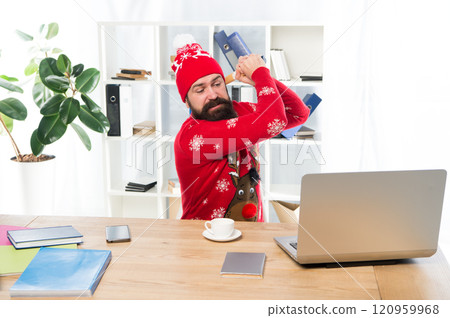 Contractual right to not work on Christmas Day. Mad worker destroy laptop with hammer. Refuse to work on Christmas. Employment rights concept. Days off as paid leave. Forced to work on Christmas Eve 120959968