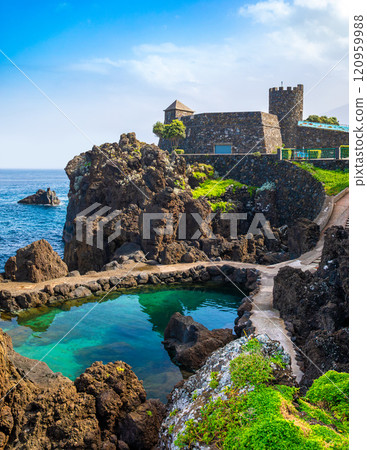 View of the small resort village of Porto Moniz on the Atlantic coast of Madeira Island, Portugal View of the small resort village of Porto Moniz on the Atlantic coast of Madeira Island, Portugal 120959988