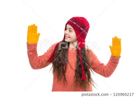 Teen girl in earflap hat of winter fashion style and knitted warm sweater with mittens isolated on white Teen girl in earflap hat of winter fashion style and knitted warm sweater with mittens isolated on white 120960217