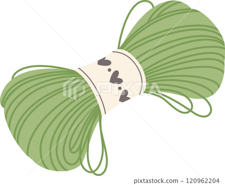 Green yarn ball with a heart decorated label, perfect for knitting or crocheting warm clothes and accessories, embodying creativity and handmade crafts 120962204