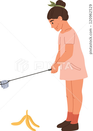 Woman uses a reaching tool to pick up a discarded banana peel, demonstrating responsible waste disposal and promoting environmental cleanliness 120962529