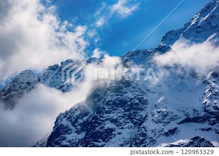 Mountain peaks near Morskie Oko Lake in Poland at Winter. Tatras range 120963329