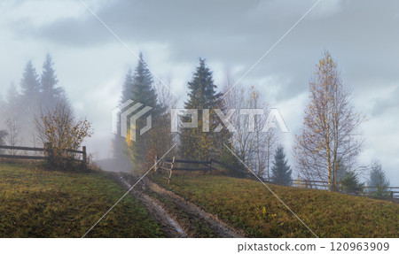 Foggy autumn mountain sunrise scene. Peaceful picturesque traveling, seasonal, nature and countryside beauty concept scene. Foggy autumn mountain sunrise scene. Peaceful picturesque traveling, seasonal, nature and countryside beauty concept scene. 120963909