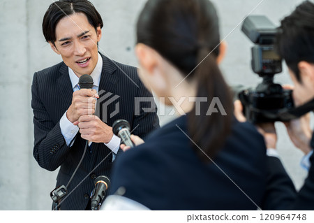 Businessman holding an apology conference 120964748