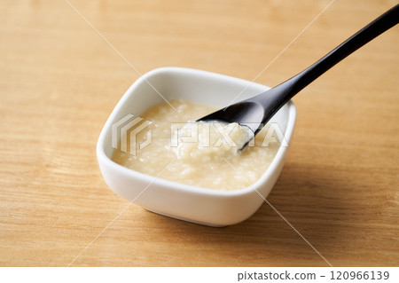 Scoop salted koji with a spoon 120966139